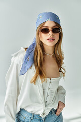 Stylish young woman radiates spring vibes in chic outfit with modern accessories