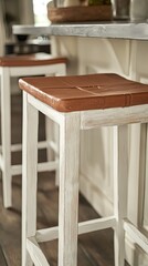Rustic-modern stool featuring a hand-painted terracotta-colored seat with white frame.