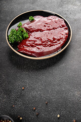 Raw liver beef veal meat steak liver grill appetizer vegetables dish fresh delicious gourmet food background on the table rustic food top view copy space keto and paleo diet