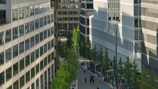 sunny day zurich city center famous modern office exterior walking street aerial panorama 4k switzerland  