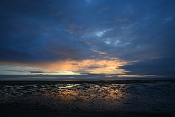 sunrise with clouds on the beach