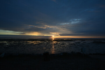 sunrise with clouds on the beach