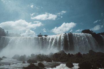 Iguazu falls from brazilian side. with sky with clouds