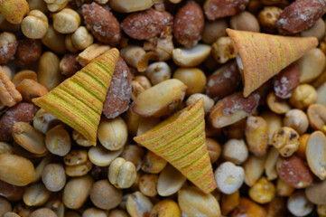 Crunchy snacks spread out on a colorful assortment of nuts perfect for sharing during festive gatherings