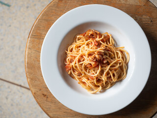 top view tomato sauce spaghetti on wooden table
