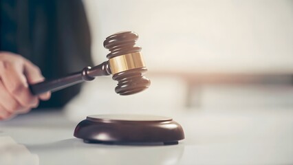 Fototapeta premium Law theme, mallet of the judge, law enforcement officers, evidence-based cases and documents taken into account