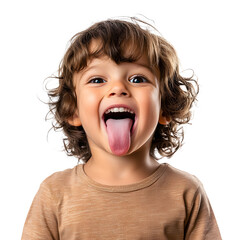 Playful toddler making a silly face with tongue out, cute child portrait against white background, smiling kid pulling funny expression.