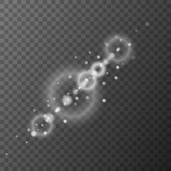 The dust sparks and stars shine with special light. Vector sparkles on a transparent background. Vector illustration. White shimmering background with light effect
