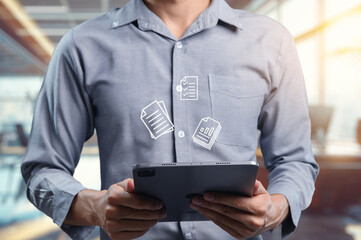 Businessman Checks Important Documents on Digital Tablet in Office
