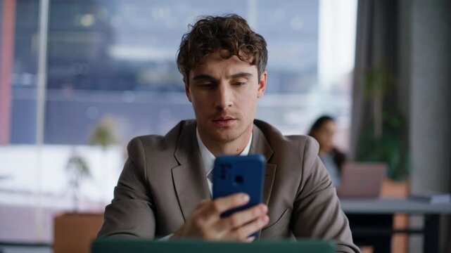 Office manager receive message with good news closeup. Man winning promotion