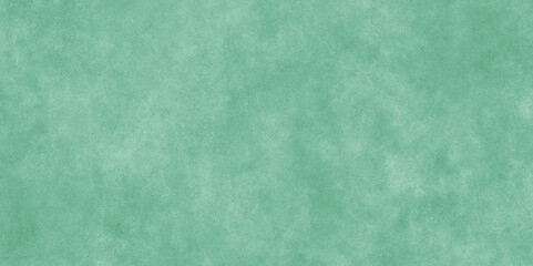 Abstract Elegant dark green background with mottled vintage texture in old fancy background design, texture of colored parchment paper.