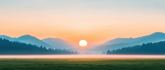 Fototapeta premium A serene sunrise over distant mountains, casting warm hues across the sky, with a tranquil field in the foreground.