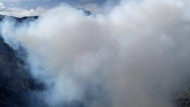 Bromo volcano smoke riving from the crater Java Indonesia