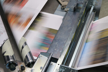 Industrial colors printing machine working on continuing reels of paper with modern inkjet...
