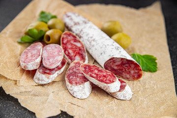 Fuet sausage Spanish meat delicacy fresh delicious gourmet food background on the table rustic food top view copy space