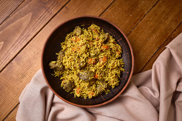 Spiced Rice with Meat and Vegetables in Bowl