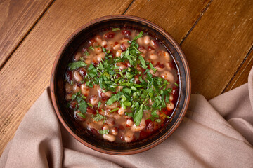 Homemade Bean Stew with Fresh Herbs in Bowl