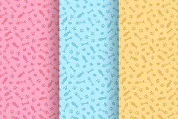 Cat's paws prints, hearts, fishes and fish bones. Vector seamless patterns collection in pastel colored variations.
