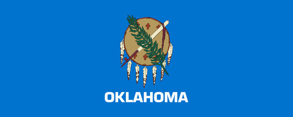 Oklahoma flag featuring a traditional shield with feathers on a blue background