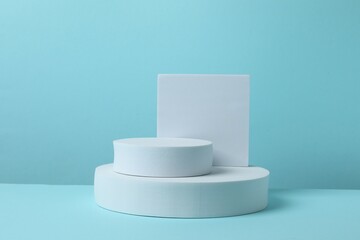 White podiums on a blue background