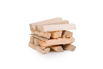 Stack of chopped kindling wood arranged in a compact pile, isolated on a transparent background. Ideal for starting fires or camping use. Natural texture visible..
