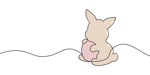 Simple one-line drawing of a beige bunny holding a pastel pink polka-dotted egg, symbolizing Easter, spring, and festive celebrations. Easter bunny one line icon. Vector illustration