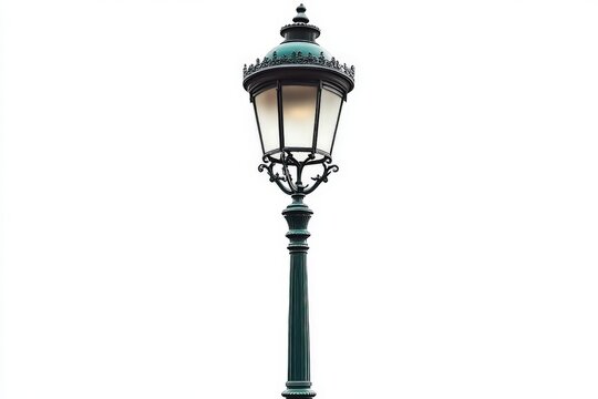Elegant street lamp illuminating a sidewalk with vintage charm in a city at dusk