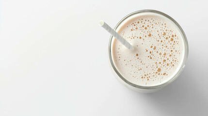 Refreshing coconut smoothie in glass with straw for summer enjoyment