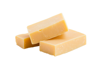 Three pieces of creamy soap on a transparent background