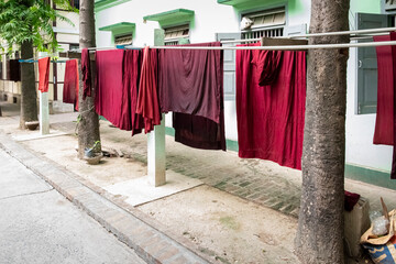 kāṣāya, kesa, traditional Buddhist monastic robe hanging out to dry.