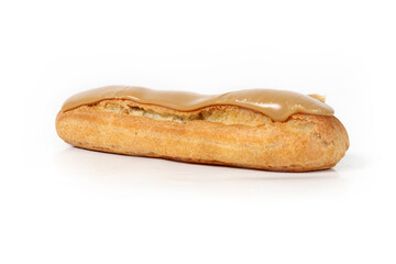 A classic coffee éclair isolated on a white background. This French pastry features a golden choux dough filled with rich coffee-flavored cream and topped with a smooth coffee glaze