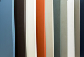 Colorful vertical panels in modern art installation with diverse hues