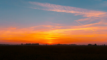 Sunset with a church silhouette near Arbing, Osterhofen, Deggendorf, Bavaria, Germany