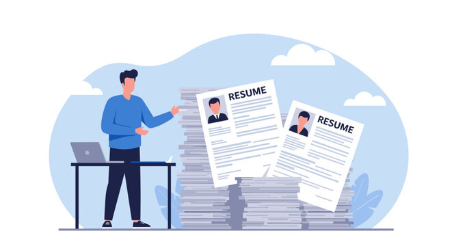 Man reviewing a pile of resumes. Job search.