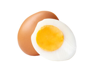 Front view of raw brown chicken egg and cooked or boiled chicken egg with egg yolk in half in small pile isolated on white background with clipping path