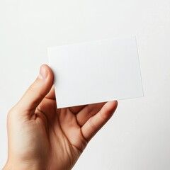 Obraz premium The hand holding a blank card isolated on white background,Clipping path Included.