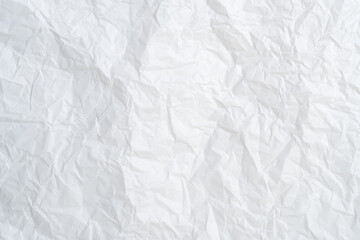 Top view and full frame of wrinkled or crumpled white paper texture used as crumpled white paper background texture in decorative art work