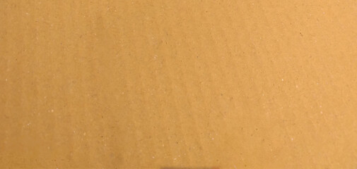 Background of brown kraft paper or cardboard texture, Beige surface background texture light rough textured spotted blank copy space background in beige yellow,brown.
