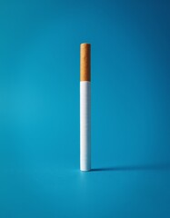 A single cigarette on a blue background