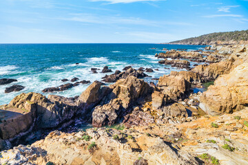 Coastal cliffs along California's Highway 1 in Northern California. Rugged ocean rocks, crashing...