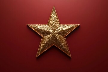 The image shows a five pointed star. It has a shiny, glittering surface. The backdrop has a solid tone.