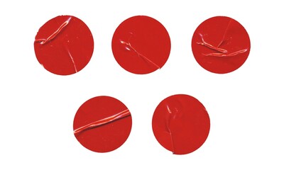 Fototapeta premium Set of red glossy paper circles with creases, isolated blank round sticker on white background
