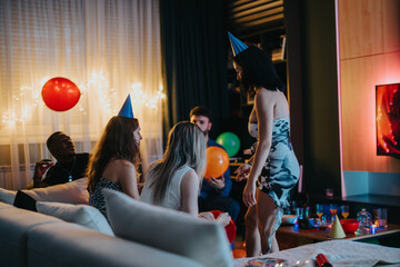 A group of friends enjoying a festive celebration in a cozy living room setting, surrounded by vibrant decorations, balloons, and party lights, engaging in laughter and spirited conversations.