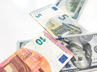 Banknotes of 100 dollar Banknotes of 100 euros Background of cash dollar and euro bills. American currency European currency United States Cash banknotes Financial Money background concept.