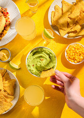 Nachos with guacamole, traditional Mexican snack