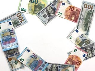 Banknotes of 100 dollar Banknotes of 100 euros Background of cash dollar and euro bills. American currency European currency United States Cash banknotes Financial Money background concept.