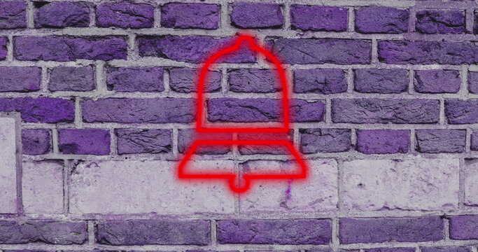 Neon red bell icon glowing on purple brick wall background