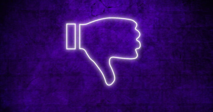 Neon thumbs down sign glowing against dark textured wall background