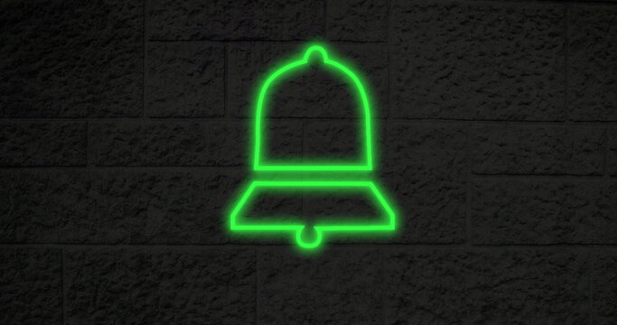 Glowing green neon bell sign on textured brick wall, symbolizing notifications