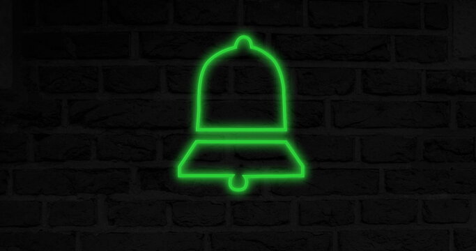 Glowing green bell icon on dark brick wall background, symbolizing notifications